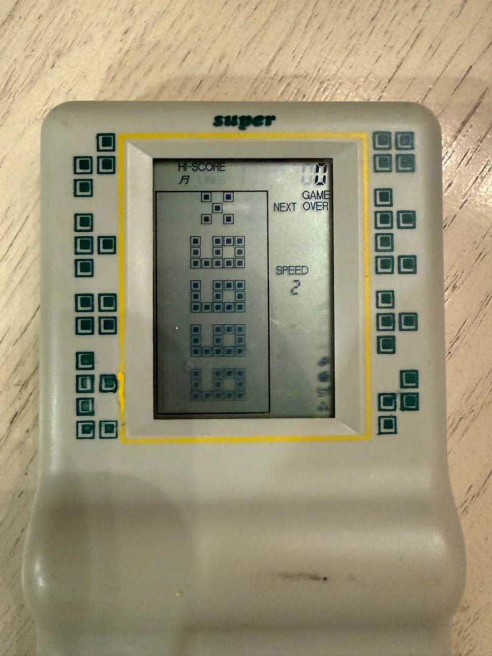 Talking Brick Game 9999-in-1 Handheld Console - grey and Yellow